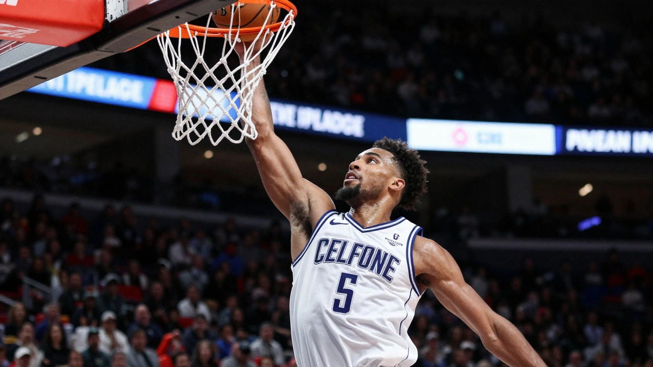 Action shot of a G League basketball player performing a powerful slam dunk